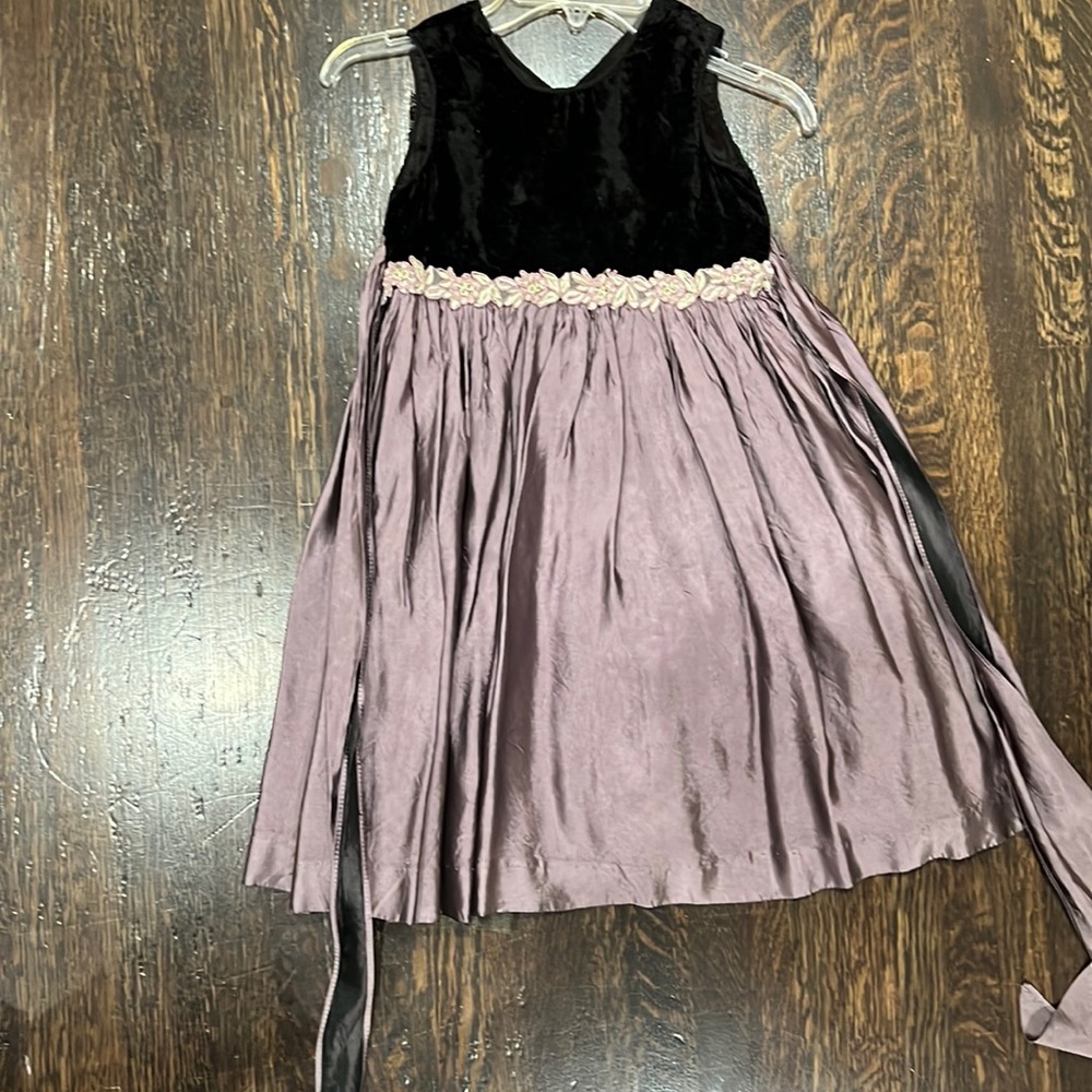 Formal children’s dress in black velvet and purple silk/satin